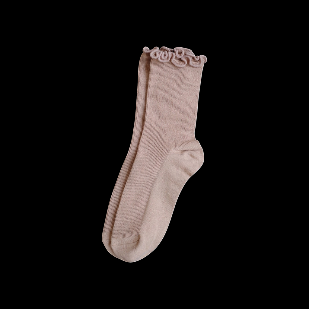 SUNMOOL beige loose-fit socks featuring a playful curly ruffle cuff for a comfortable and casual everyday style.