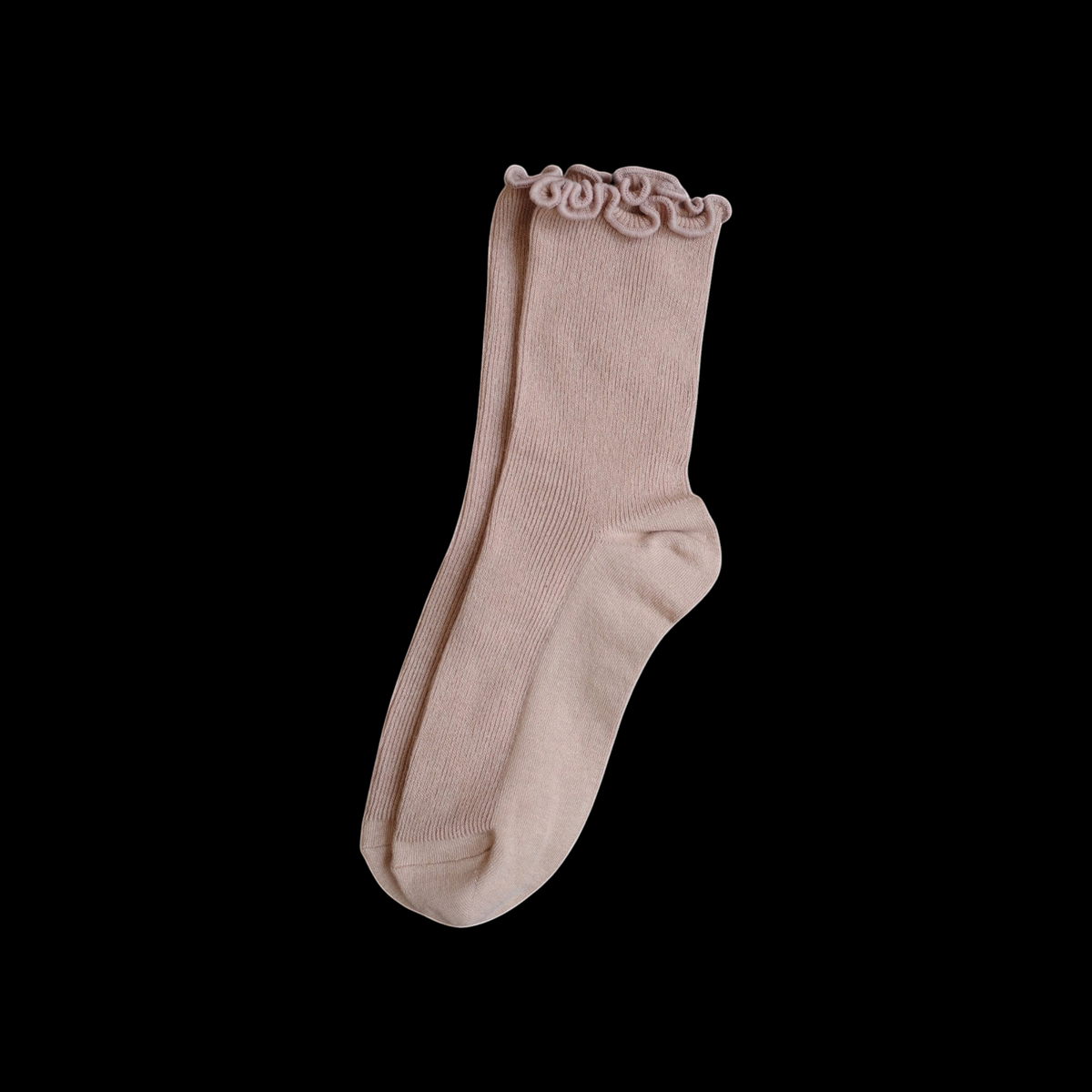 SUNMOOL beige loose-fit socks featuring a playful curly ruffle cuff for a comfortable and casual everyday style.