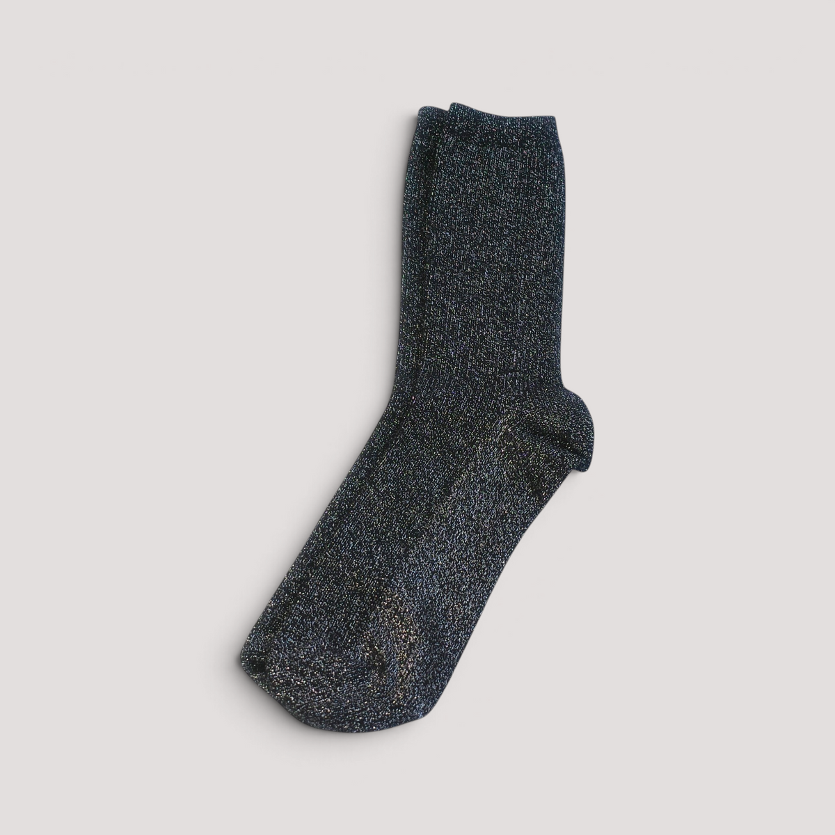 SUNMOOL black glittery mid-neck socks with a ribbed texture for a cozy and festive look.