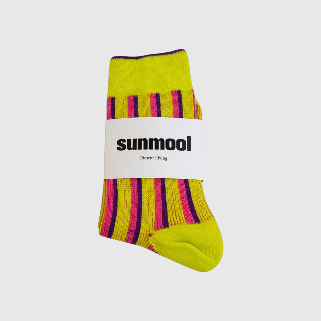 SUNMOOL dual stripe socks in neon yellow with pink and purple accents, featuring a branded paper wrap.