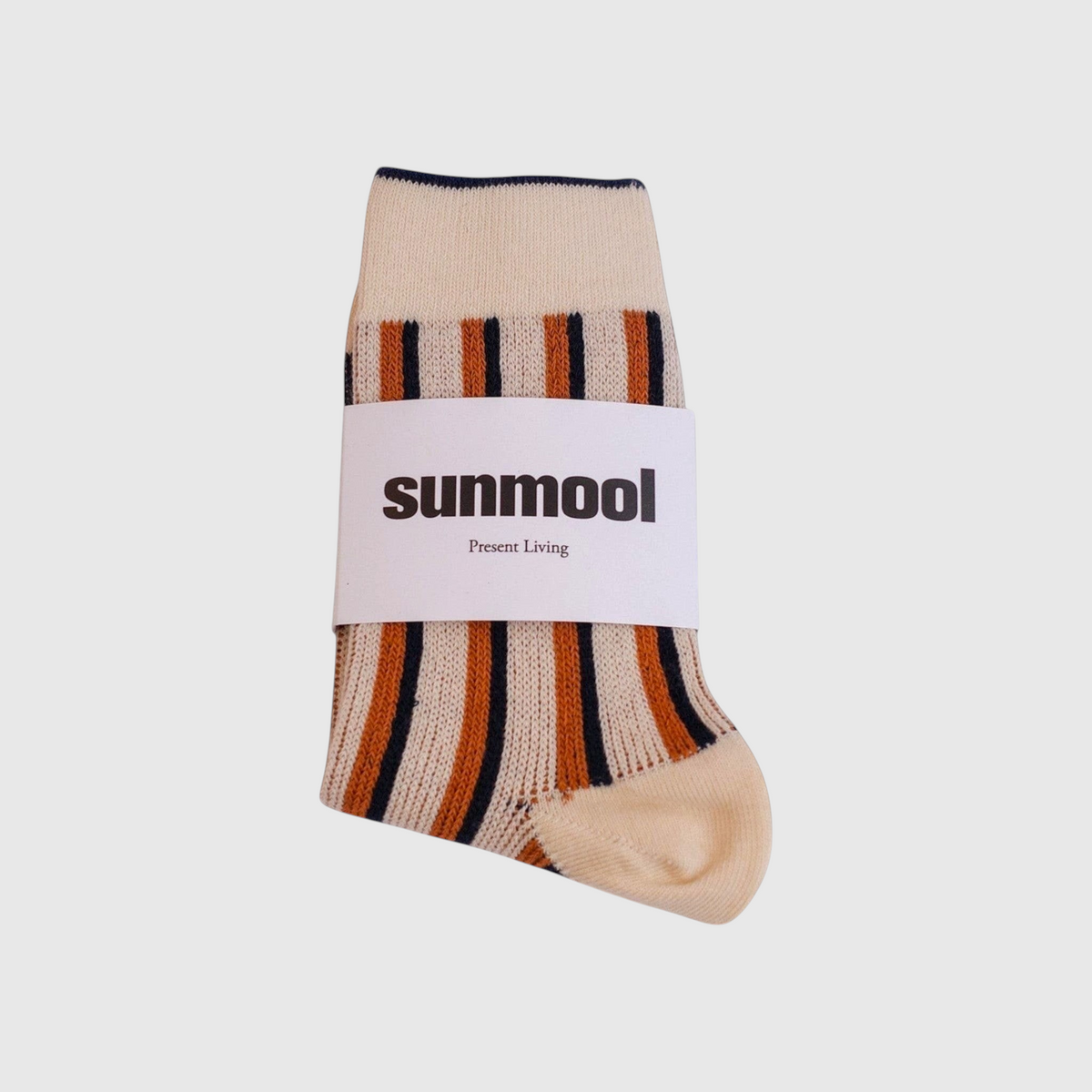 SUNMOOL dual stripe socks in ivory with orange and navy vertical stripes, featuring a branded paper wrap.