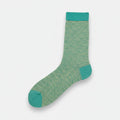 SUNMOOL Glittery Breeze Shimmer Socks in sky blue with a subtle checkered pattern and teal accents.