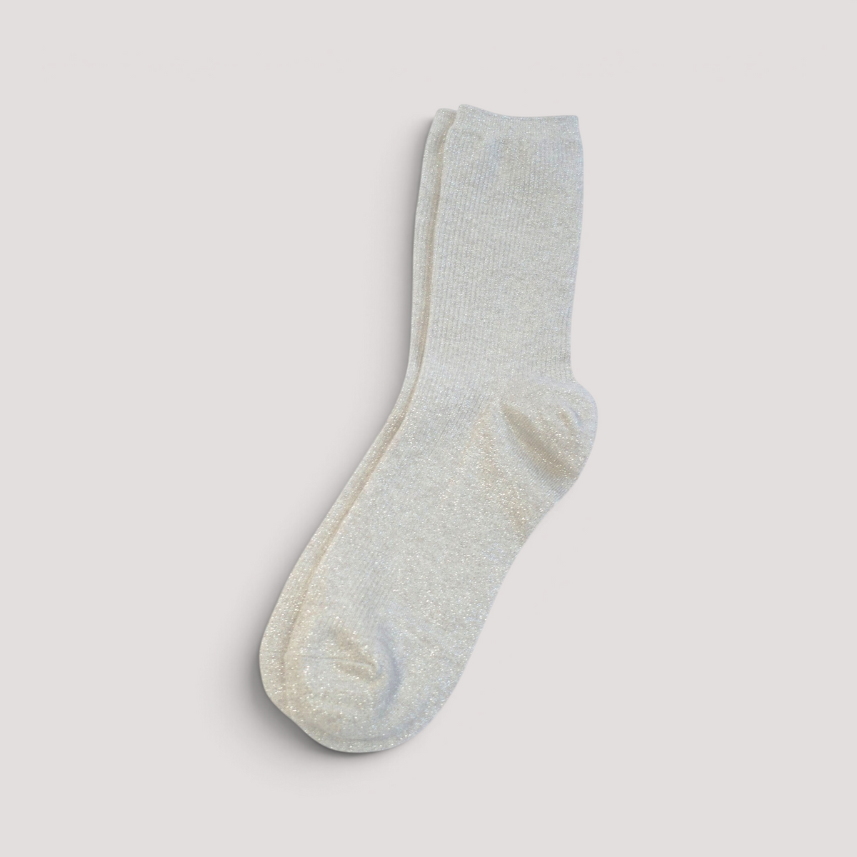 SUNMOOL ivory mid-neck socks with a subtle glittery finish and ribbed texture for a cozy festive look.