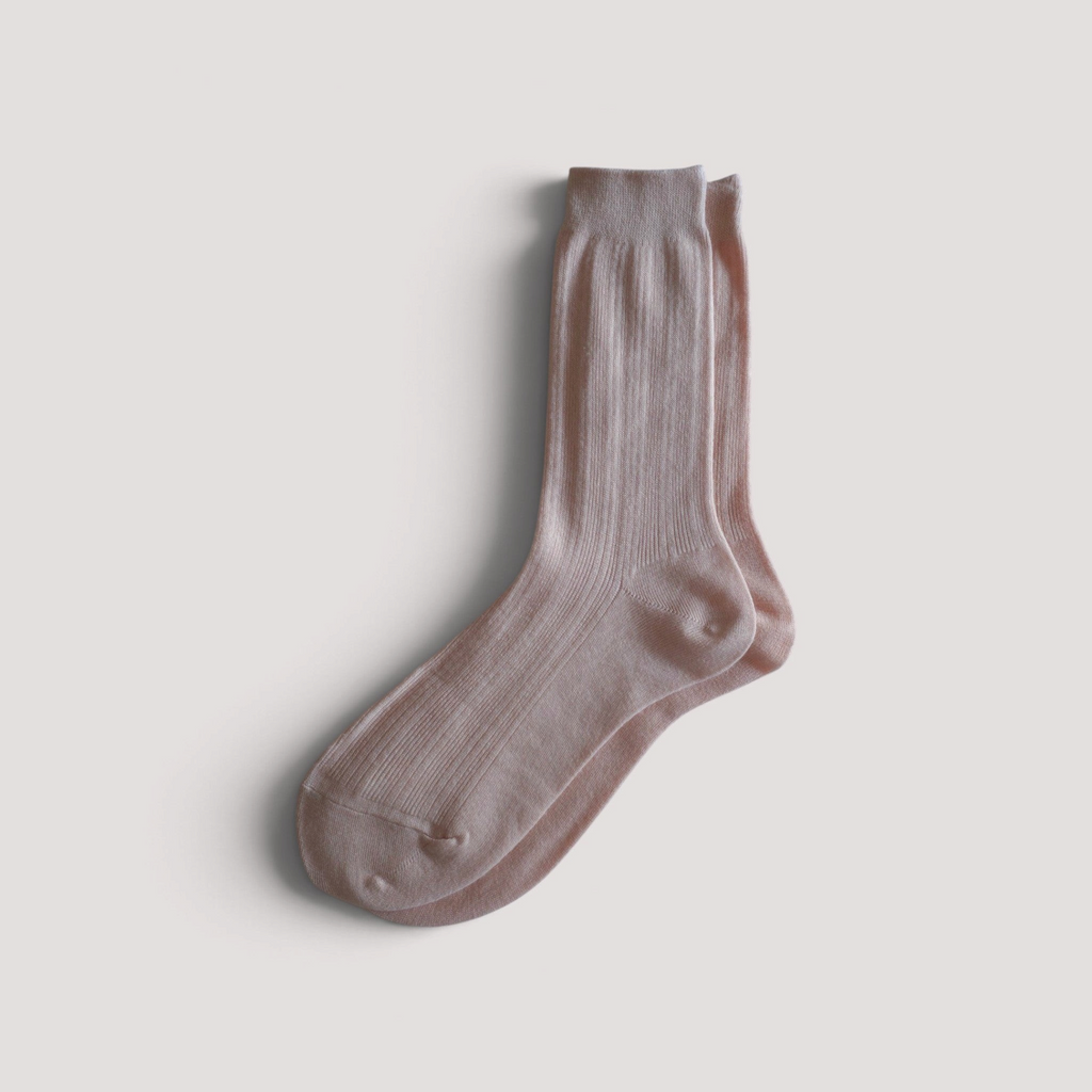 SUNMOOL Pastel Cloud socks in a soft lavender ribbed knit fabric, displayed as a pair on a neutral background.
