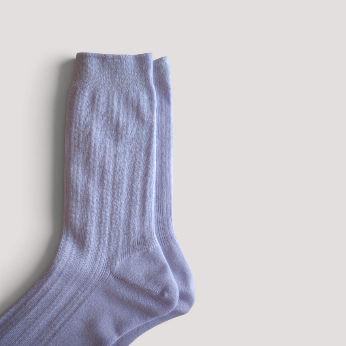 SUNMOOL Pastel Cloud lavender ribbed crew socks with a soft knit texture on a neutral background.