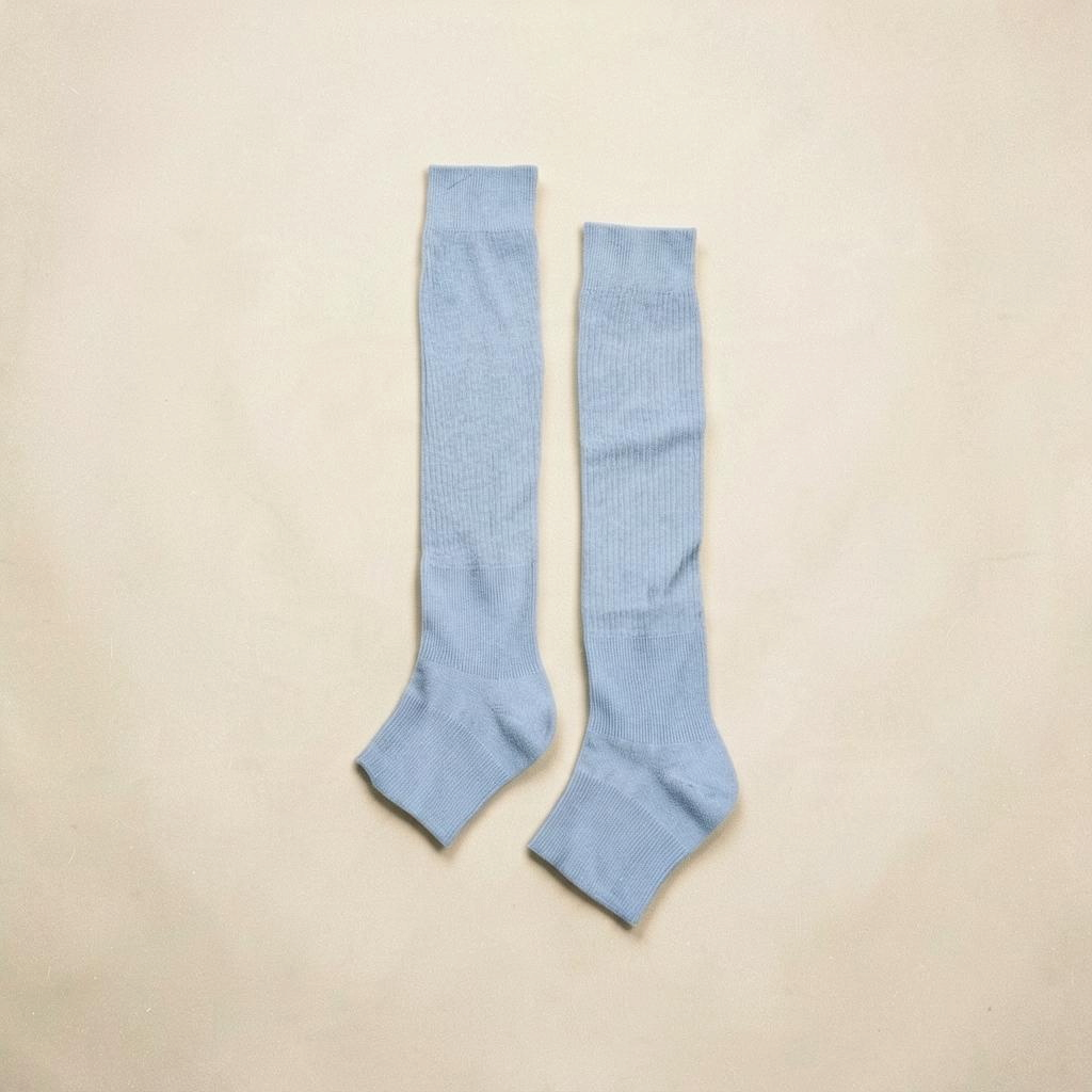 SUNMOOL light blue ribbed knee-high open-toe socks for ballet-inspired styling with sandals or loafers.