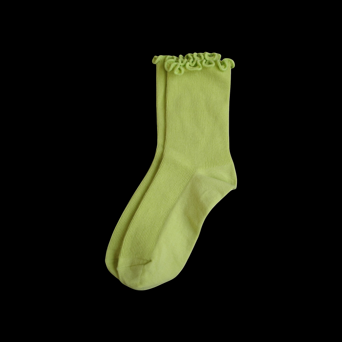 SUNMOOL lime green loose-fit socks featuring a playful curly ruffle cuff for a relaxed and comfortable everyday fit.