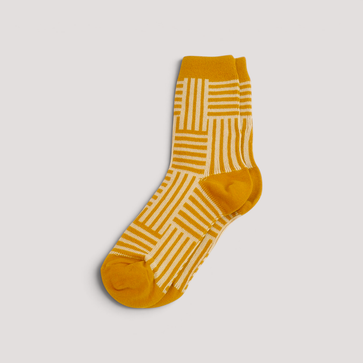 SUNMOOL mustard yellow crew socks with a white geometric line drawing pattern