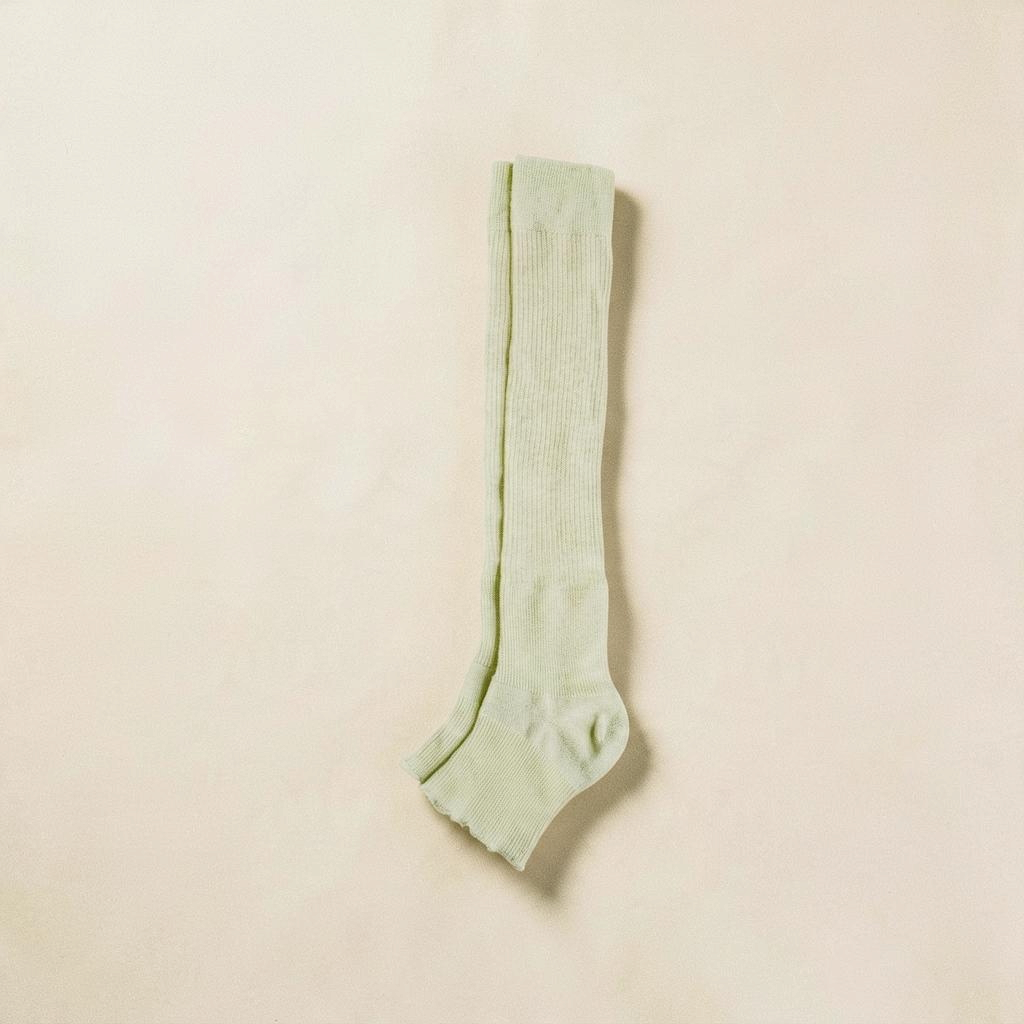 SUNMOOL sage green ribbed open-toe knee-high socks for ballet-inspired styling with sandals or loafers.