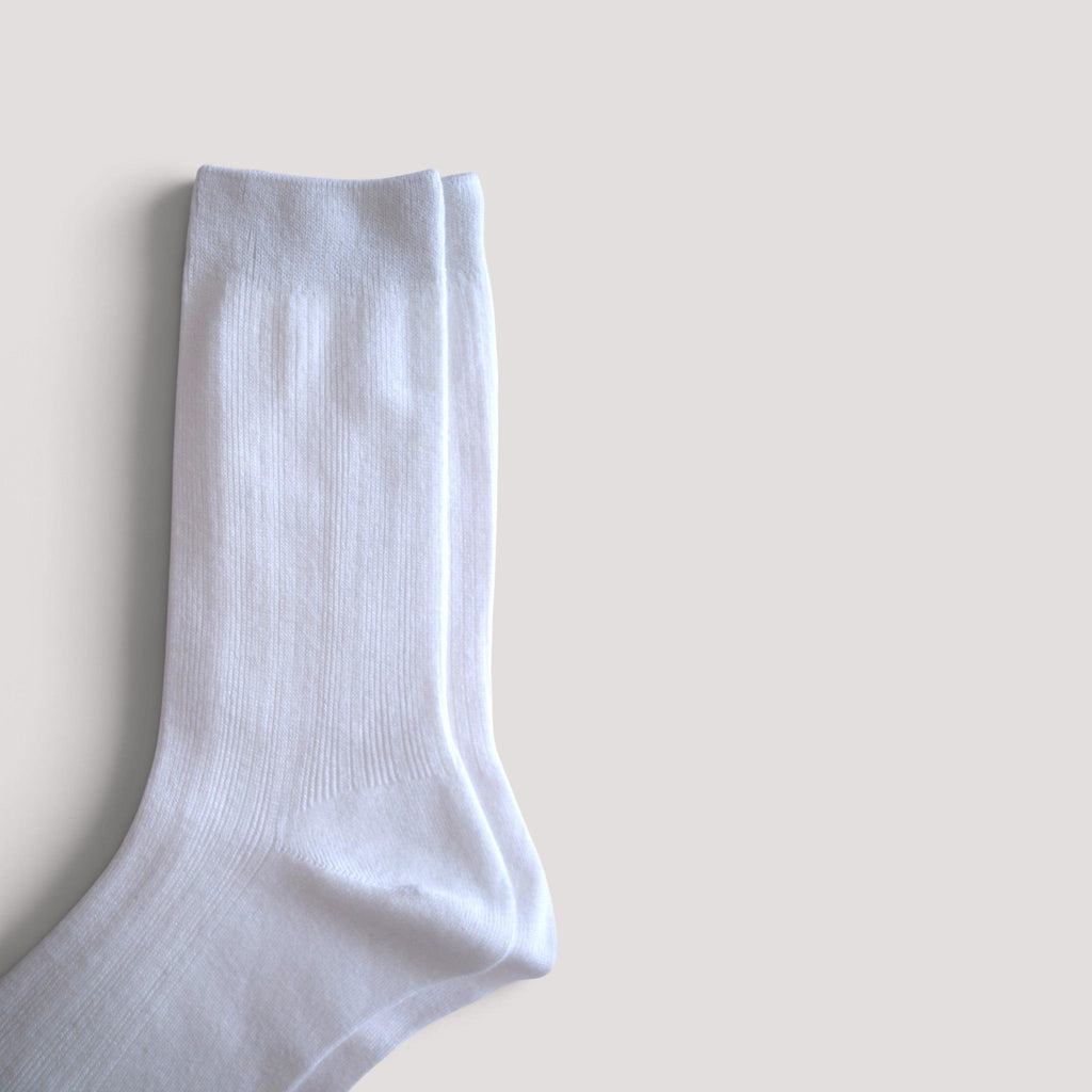 SUNMOOL Pastel Cloud white crew socks with a soft ribbed texture, perfect for everyday comfort.