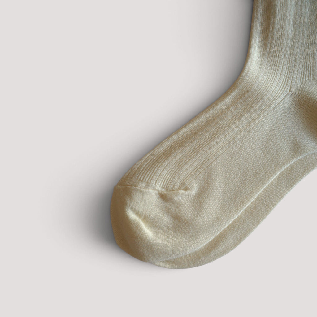 SUNMOOL Pastel Cloud white ribbed cotton socks featuring a soft knit texture and comfortable fit.