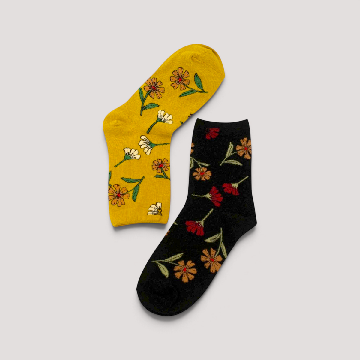 SUNMOOL Dear Wild Flower socks in mustard and black with vibrant botanical floral patterns and elastic construction.